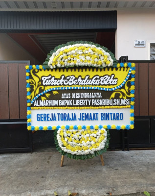 Papan Bunga Duka di Junjung Sirih
